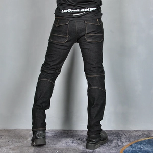 Rear view of black motorcycling jeans with yellow contrast stitching and cargo pockets