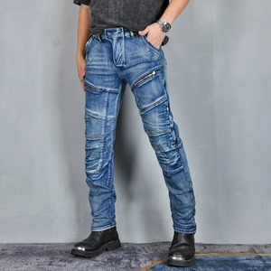 Detail shot of men's blue motorcycle jeans with reinforced pockets and zipper accents