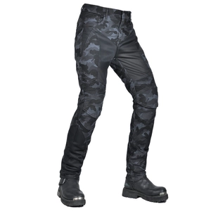 Detail of motorcycle pants with camouflage print and elastic pleats on knees for protection