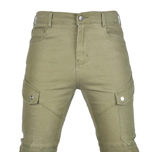 Detail of army green motorcycle cargo pants showing durable fabric and large flap pockets