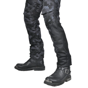 Detail of blue camo motorcycle jeans with mesh panels and leather riding boots