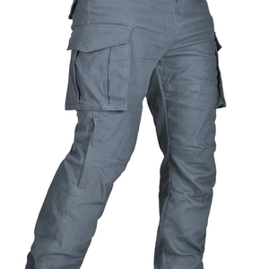 Detailed view of cargo pants featuring multi-pocket design and reinforced knee stitching