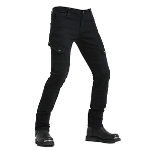 Detail of army green tactical motorcycle pants with cargo pockets and metal snap buttons