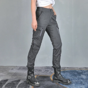Women's motorcycle riding pants in dark grey cargo style with protective silicone gear