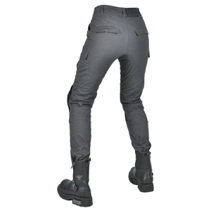 Detail of dark grey motorcycle pants featuring reinforced stitching and utility pockets