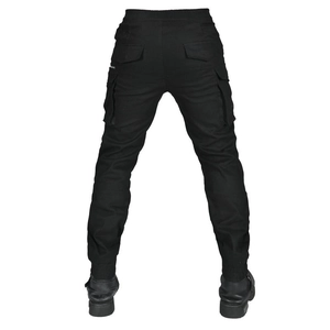 Rear view of black cargo motorcycle pants showing elastic waist and multiple utility pockets