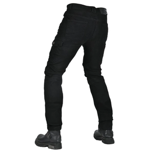Close-up of black reinforced motorcycle riding jeans with ergonomic fit and waist leather tag