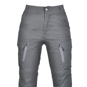 Detail of high-waist women's motorcycle pants featuring tactical cargo side pockets