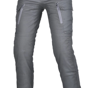 Detail of grey motorcycle riding pants with reinforced knees and side zipper tactical pockets