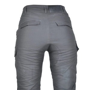 Detail view of motorcycle cargo pants featuring rear flap pockets and leather logo patch