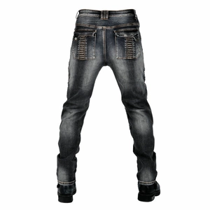 Détails du jean moto avec panneaux extensibles en accordéon et poches arrière de sécurité