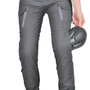 Detailed view of women's motorcycle riding pants with CE certified knee protectors