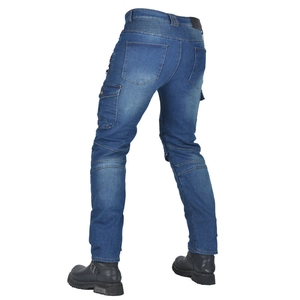 Detail of vintage blue motorcycle jeans showing stretch panels and cargo side pockets