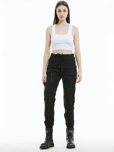 Women's waterproof motorcycle riding pants in black techwear cargo style with pockets