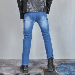 Rear view of slim-fit blue motorcycle jeans featuring stitched knee panels and pockets