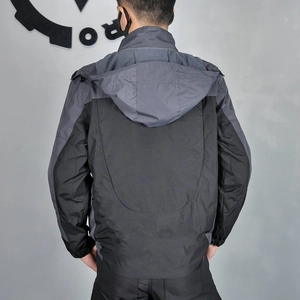 Detail of waterproof motorcycle jacket with windproof fleece lining and hooded back design