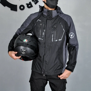 Detail of waterproof motorcycle jacket with zipped pockets and protective hood