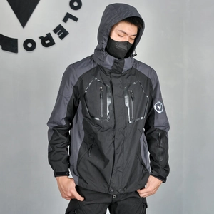 Detail of waterproof zippers and windproof hood on a black and grey motorcycle jacket