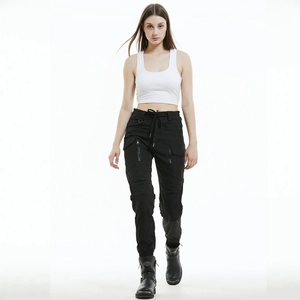 Close-up of women's black motorcycle cargo pants with protective knee panels and side pockets