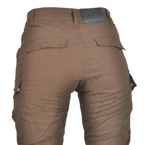 Detail of brown motorcycle pants with leather brand patch and reinforced stitching
