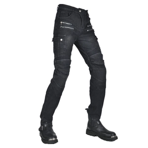 Detail of motorcycle pants featuring accordion stretch panels and metal zipper pockets