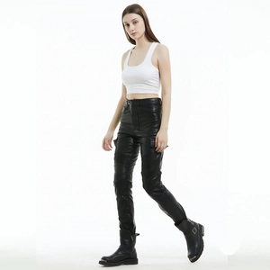 Women's black slim-fit motorcycle leather pants with cargo pockets and pleated knee panels