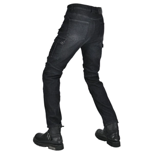 Detail of biker jeans with elastic accordion panels and cargo pockets on dark denim