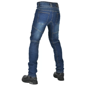 Detail of stretch accordion panels on blue motorcycle jeans with reinforced stitching
