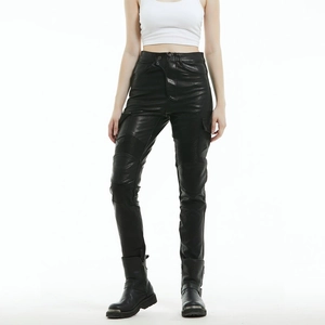 Detailed close-up of women's motorcycle leather pants with elastic knee panels and side pockets