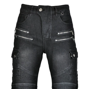 Detail of motorcycle jeans showing utility pockets, zippers and ribbed stitching texture