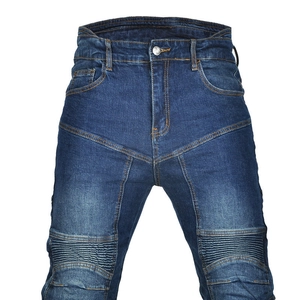 Detail of blue motorcycle jeans featuring flexible accordion panels at the knees