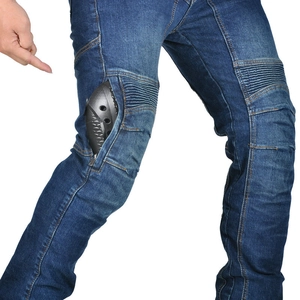 Detail showing removable protective knee pads and elastic panels on motorcycle jeans