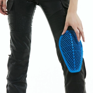 Blue honeycomb silicone knee pad detail for slim fit motorcycle riding pants