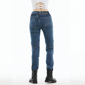 Women's slim fit motorcycle riding jeans in dark blue denim with protective accordion panels
