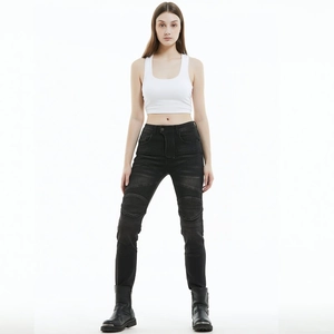 Detail of slim-fit motorcycle jeans for women featuring reinforced knee padding protection