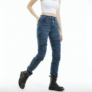 Detail of reinforced quilting and accordion stretch panels on blue motorcycle jeans