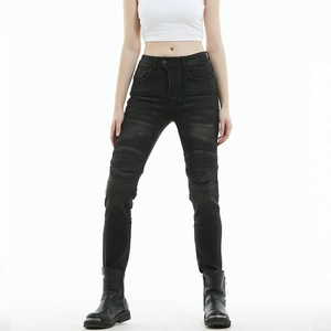 Close-up of women's black motorcycle jeans with stretch knee panels and slim-fit cut
