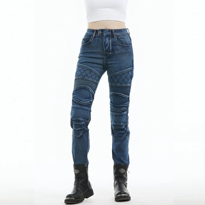 Detail view of women's motorcycle jeans featuring quilted knee panels and accordion stretch