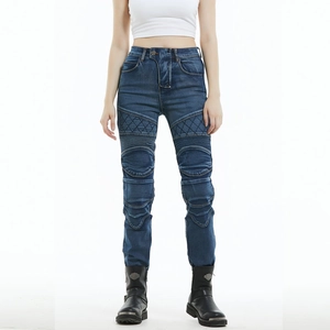 Detail of blue motorcycle riding jeans with accordion knees and quilted thigh stitching