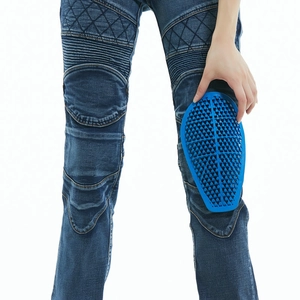 Detail of blue motorcycle jeans with honeycomb protective pads and quilted knee stitching
