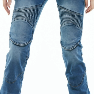 Detail of ribbed knee panels and reinforced stitching on blue biker motorcycle jeans