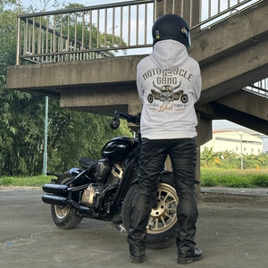 Back view of a white fleece motorcycle hoodie featuring a vintage skull graphic print