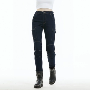Detail of dark blue motorcycle cargo jeans with protective knee stitching and side pockets