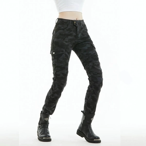 Detail of blue camo riding pants featuring cargo pockets and articulated knee pleats