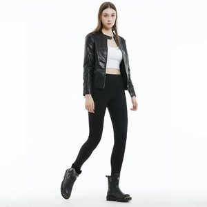 Women's black leather motorcycle jacket and stretch riding pants with armored protection