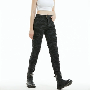 Detail of female camo riding pants featuring protective knee pleats and cargo pockets