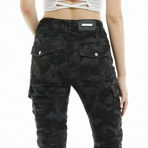 Detail of grey camo motorcycle pants showing rear cargo pockets and elastic waist pleats