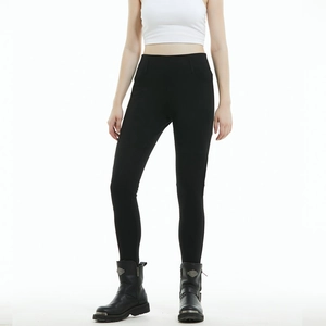 Detail of high-waisted motorcycle riding jeans for women with elastic waist design