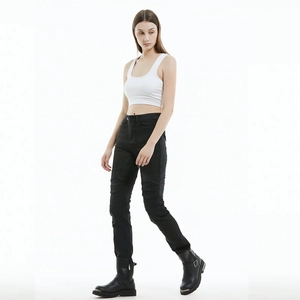 Detail of women motorcycle jeans featuring protective knee pleats and slim fit stretch fabric