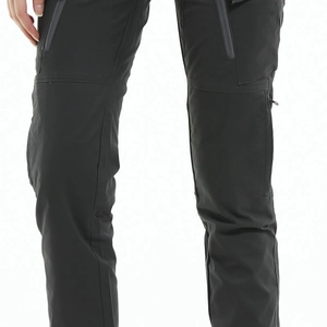 Detail of dark motorcycle riding pants featuring side utility pockets and reinforced fabric